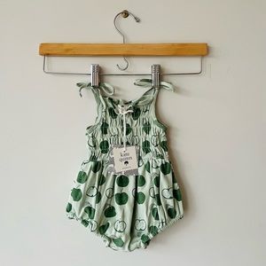 Kate Quinn Organic Cotton smocked tie bubble romper. Green apples jumpsuit NWT